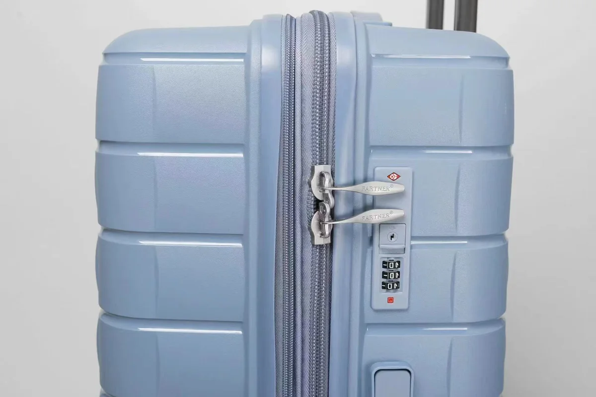 Combination lock and shell detail on a PP trolley case